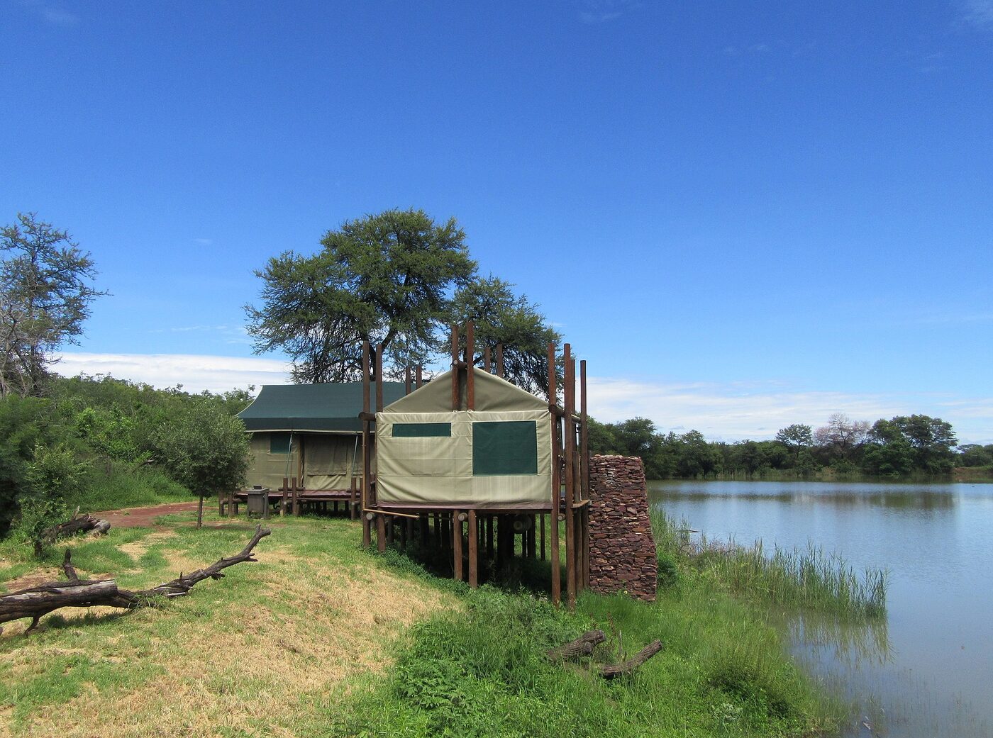 Luxury safari tented camp at dusk